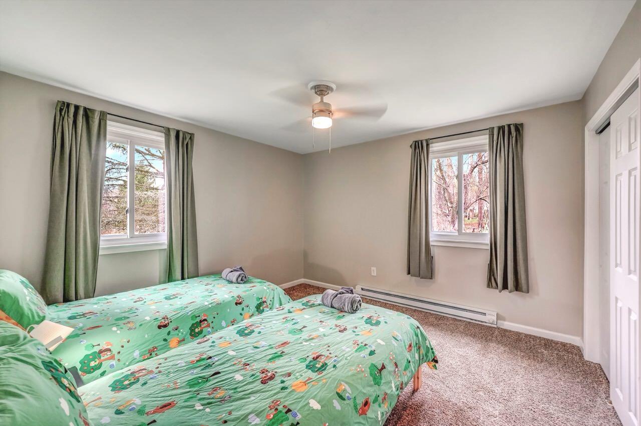 134 Altemose Road Pocono Lake, PA 18347 - Photo 33 of 48 a bedroom with a bed next to a window