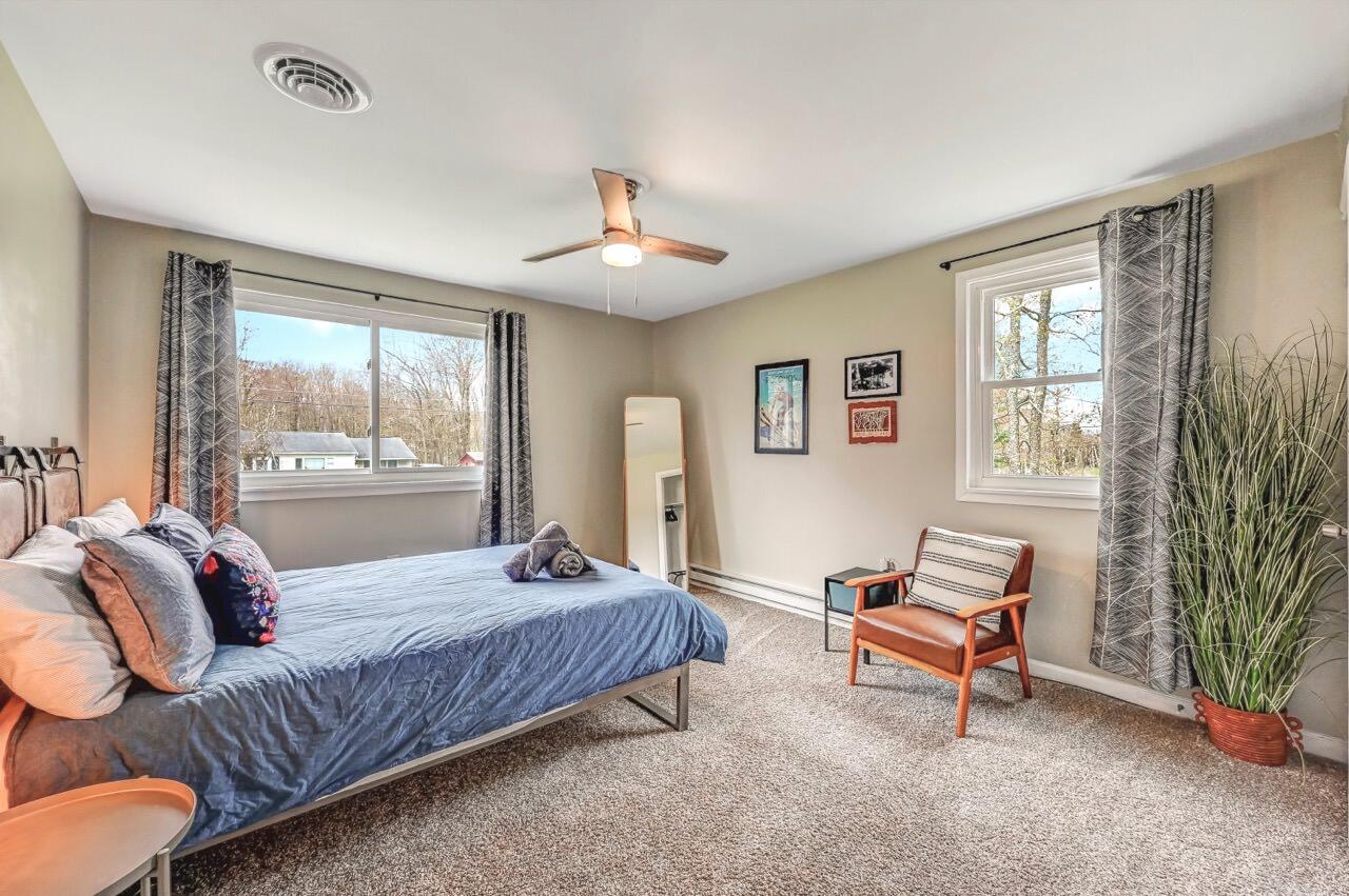 134 Altemose Road Pocono Lake, PA 18347 - Photo 39 of 48 a bedroom with furniture and a window