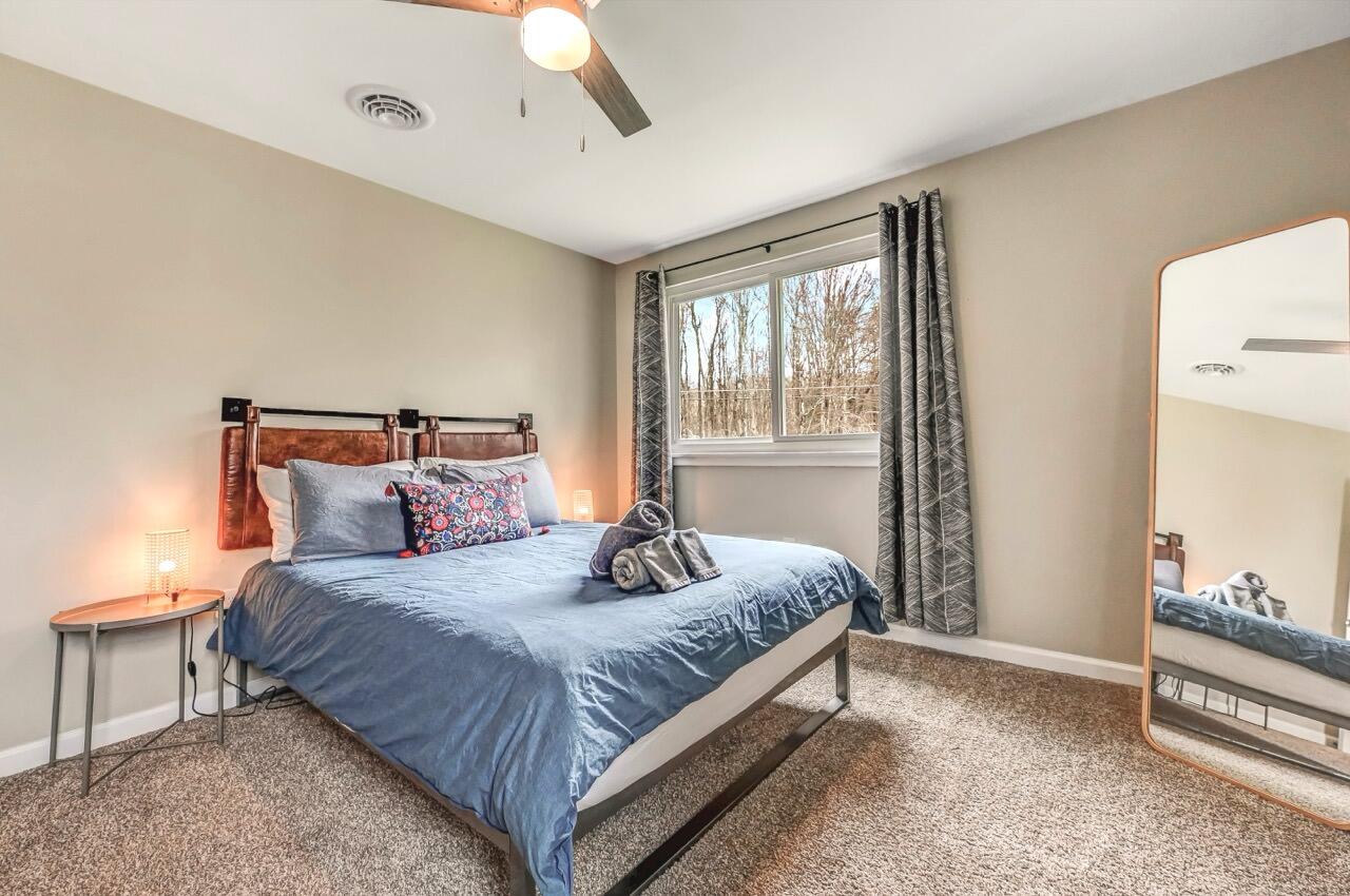 134 Altemose Road Pocono Lake, PA 18347 - Photo 40 of 48 a bedroom with a bed and window