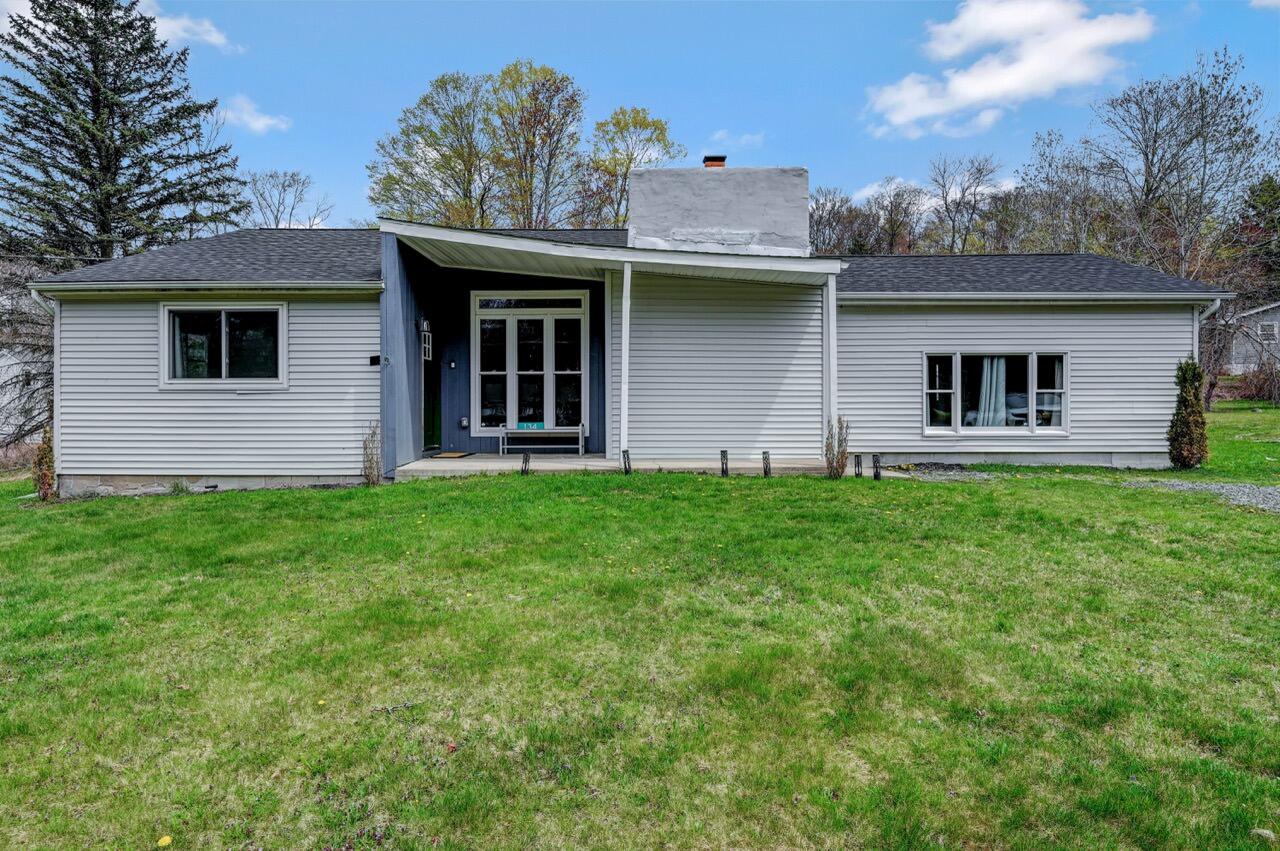 134 Altemose Road Pocono Lake, PA 18347 - Photo 47 of 48 a view of a house with a yard and a large tree