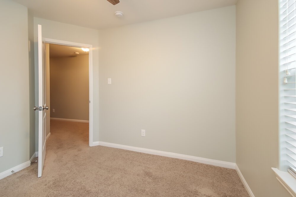 2131 Golden Topaz Drive Rosharon, TX 77583 - Photo 14 of 16 an empty room with windows and closet