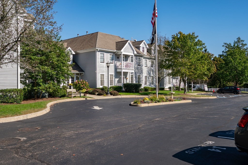 7 Assinippi Avenue, Unit 213 Norwell, MA 02061 - Photo 26 of 26 a view of a street with houses