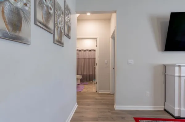 a view of a kitchen from the hallway