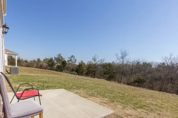 a view of a yard with an outdoor space