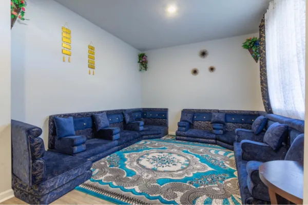 a living room with furniture and a couch