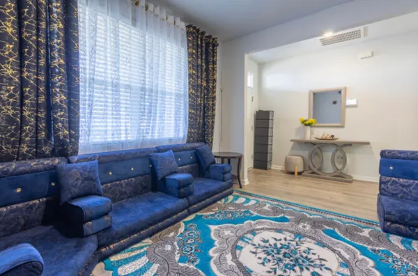 a living room with furniture and a couch