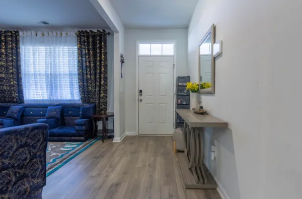 a view of livingroom with furniture and wooden floor