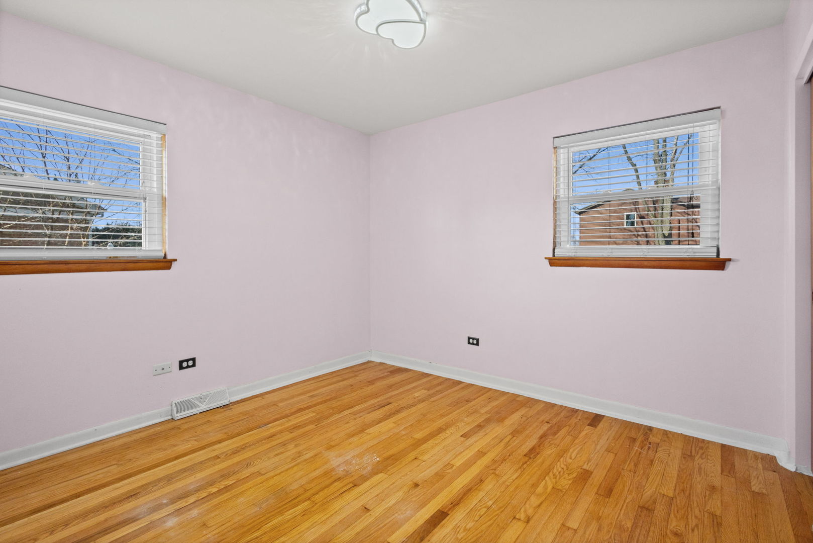 5901 108th Place Chicago Ridge, IL 60415 - Photo 8 of 15 a view of a room with wooden floor and window
