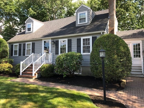138 Highgate Street Needham, MA 02492 - Photo 1 of 17 a front view of a house with a yard