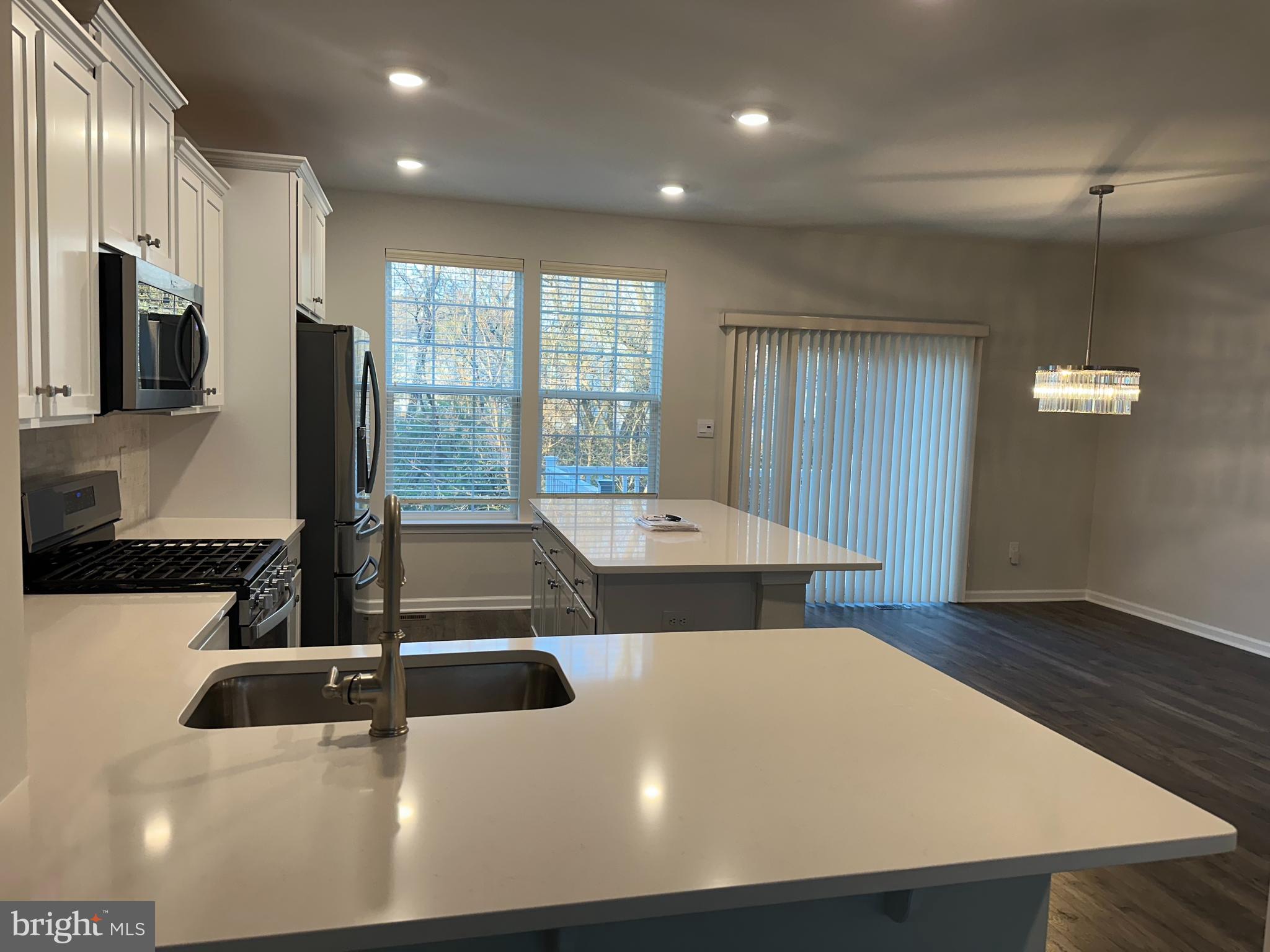 11 Lilac Circle Mount Laurel, NJ 08054 - Photo 12 of 43 a kitchen with a sink a counter top space and stainless steel appliances