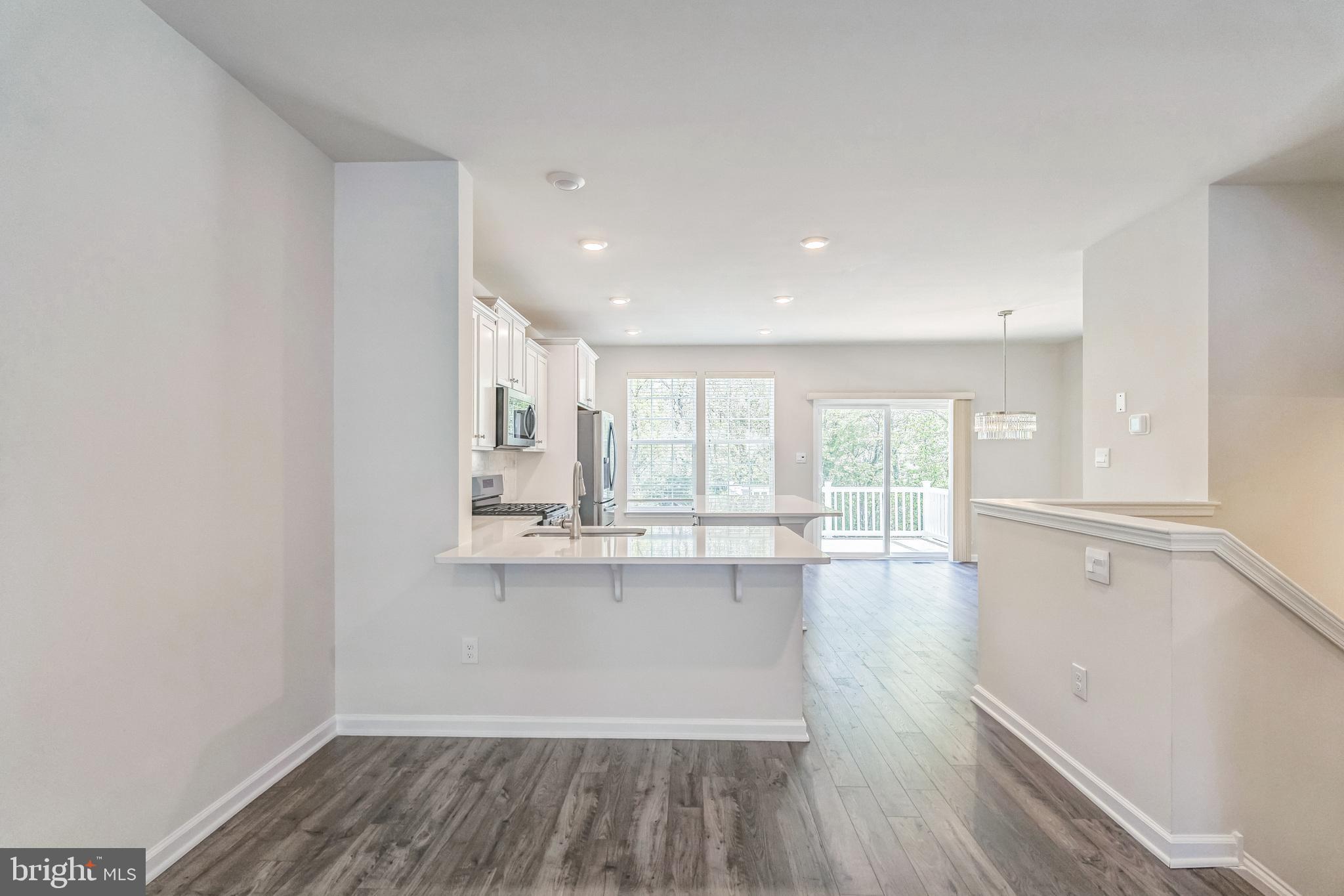11 Lilac Circle Mount Laurel, NJ 08054 - Photo 15 of 43 a view of kitchen with wooden floor and electronic appliances