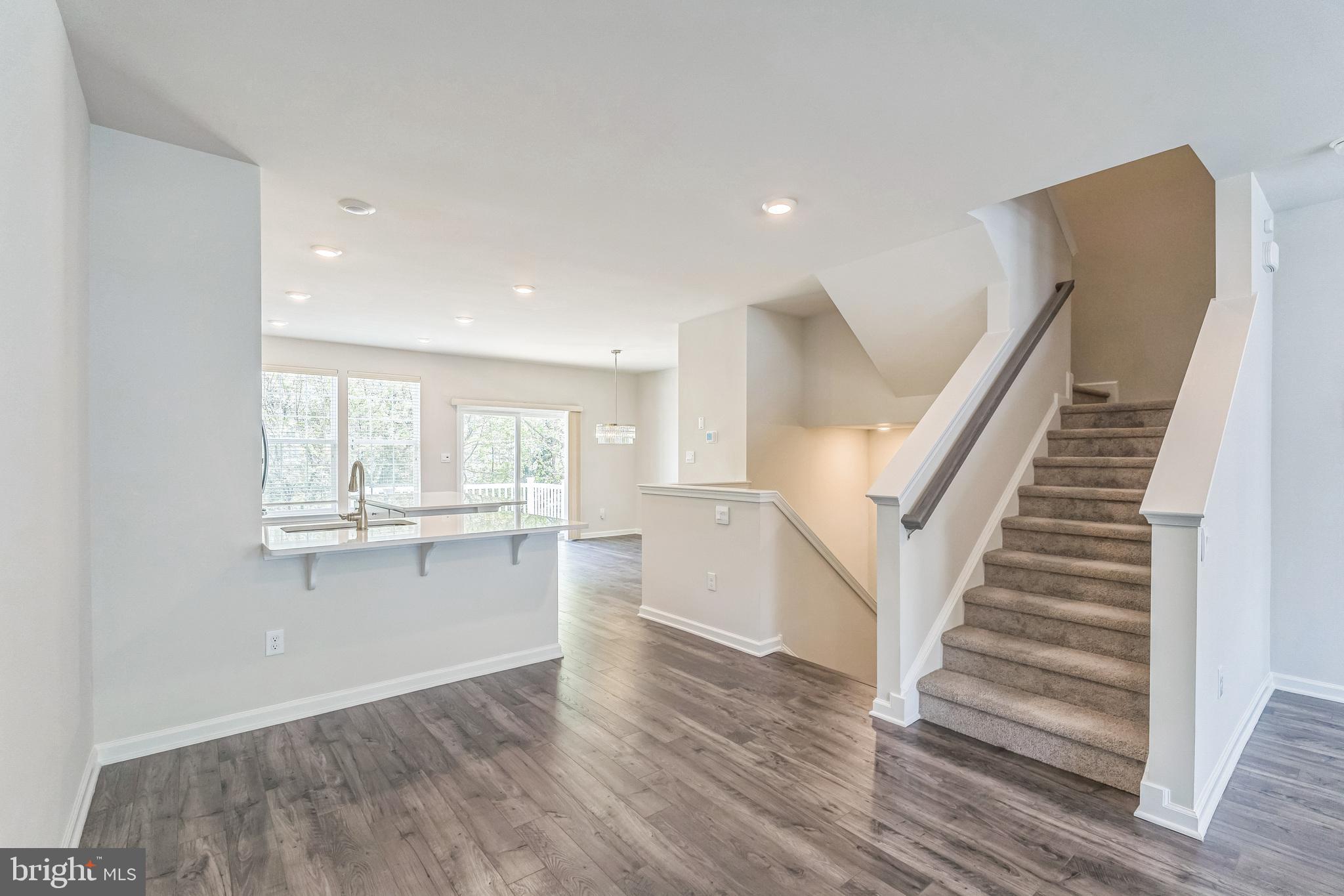 11 Lilac Circle Mount Laurel, NJ 08054 - Photo 16 of 43 a view of a kitchen with wooden floor and electronic appliances