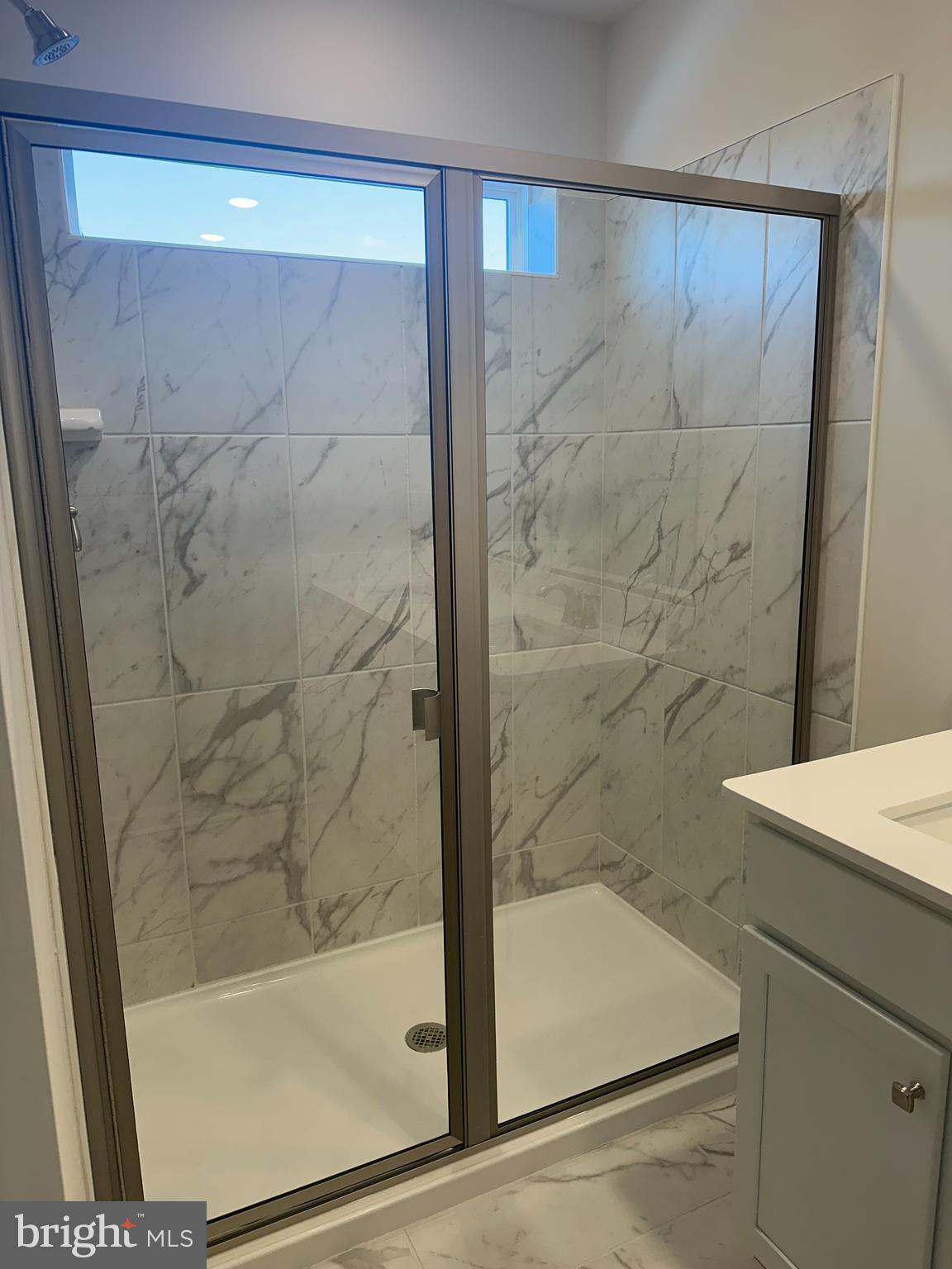 11 Lilac Circle Mount Laurel, NJ 08054 - Photo 32 of 43 a bathroom with a shower and a sink