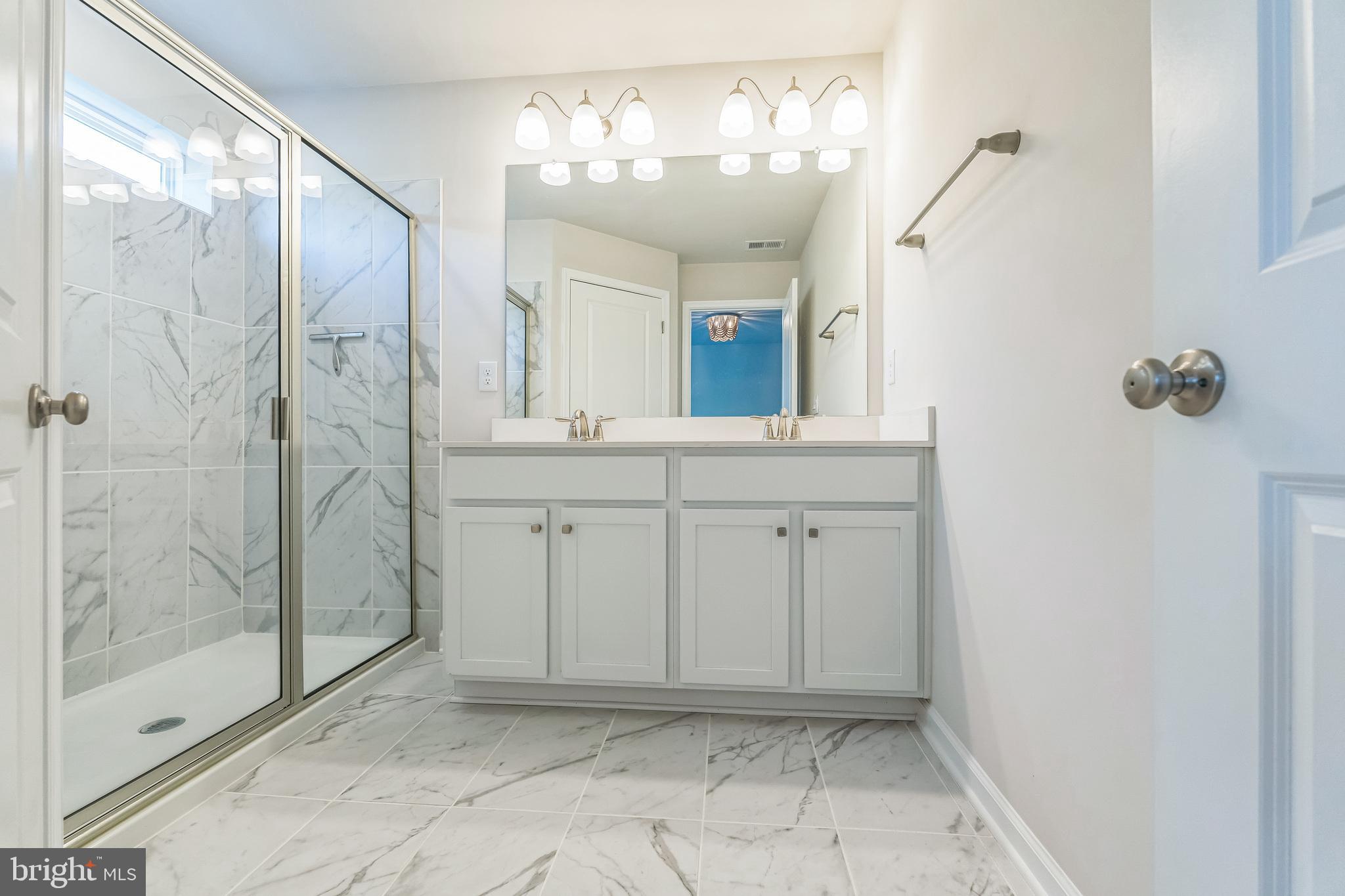 11 Lilac Circle Mount Laurel, NJ 08054 - Photo 33 of 43 a view of a bathroom from a hallway
