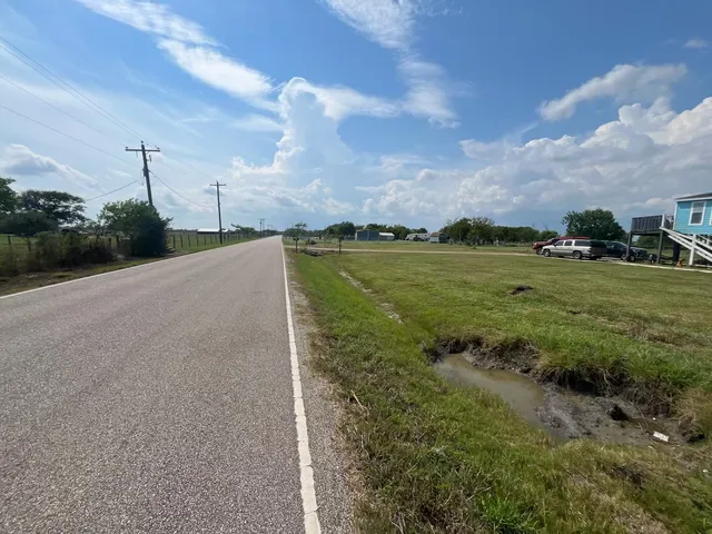 a view of a golf course with a lake