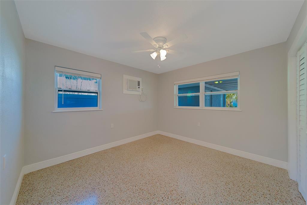 13248 4th Street East, Unit A Madeira Beach, FL 33708 - Photo 13 of 54 a view of an empty room with a window