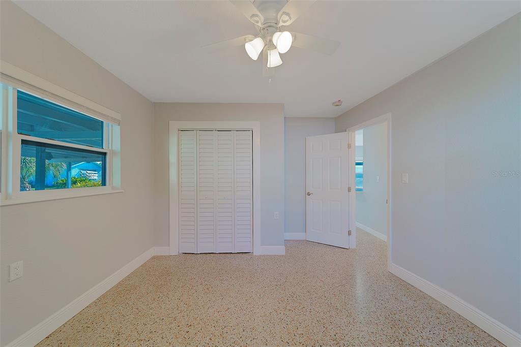 13248 4th Street East, Unit A Madeira Beach, FL 33708 - Photo 15 of 54 a view of an empty room with a window