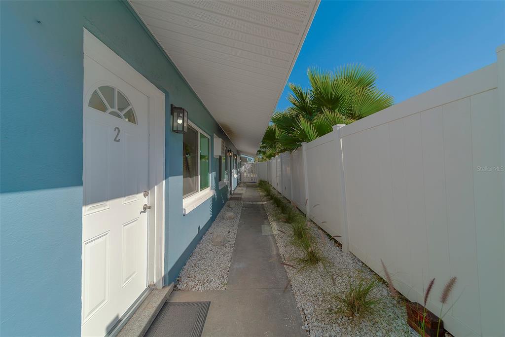13248 4th Street East, Unit A Madeira Beach, FL 33708 - Photo 30 of 54 a view of a balcony