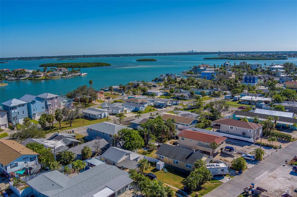 13248 4th Street East, Unit A Madeira Beach, FL 33708 - Photo 39 of 54 an aerial view of a houses with outdoor space