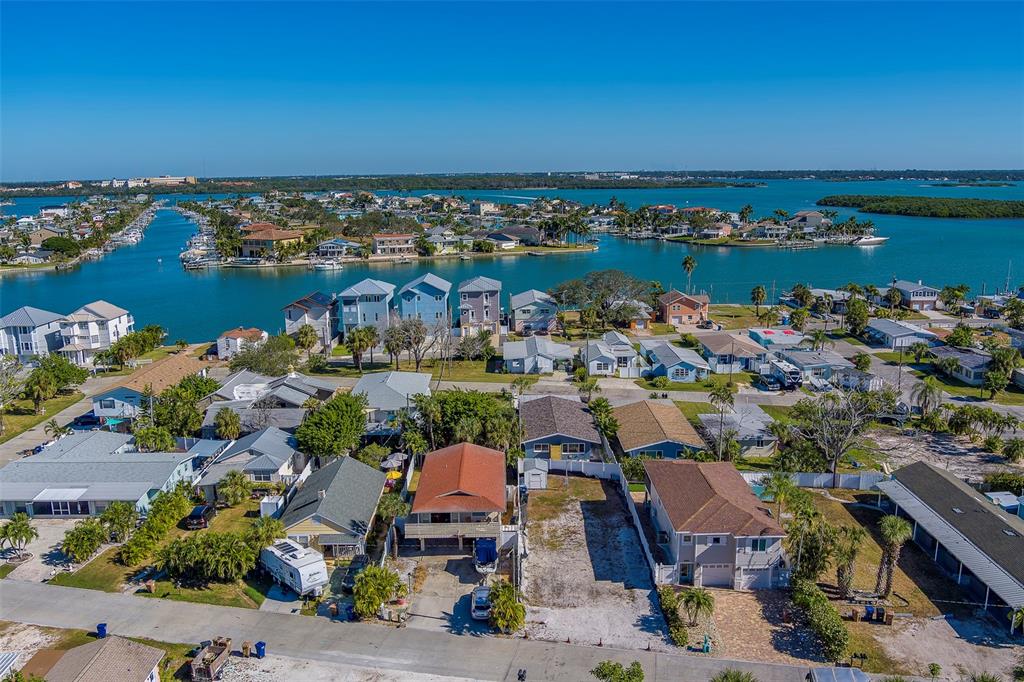 13248 4th Street East, Unit A Madeira Beach, FL 33708 - Photo 40 of 54 an aerial view of a house with a lake view