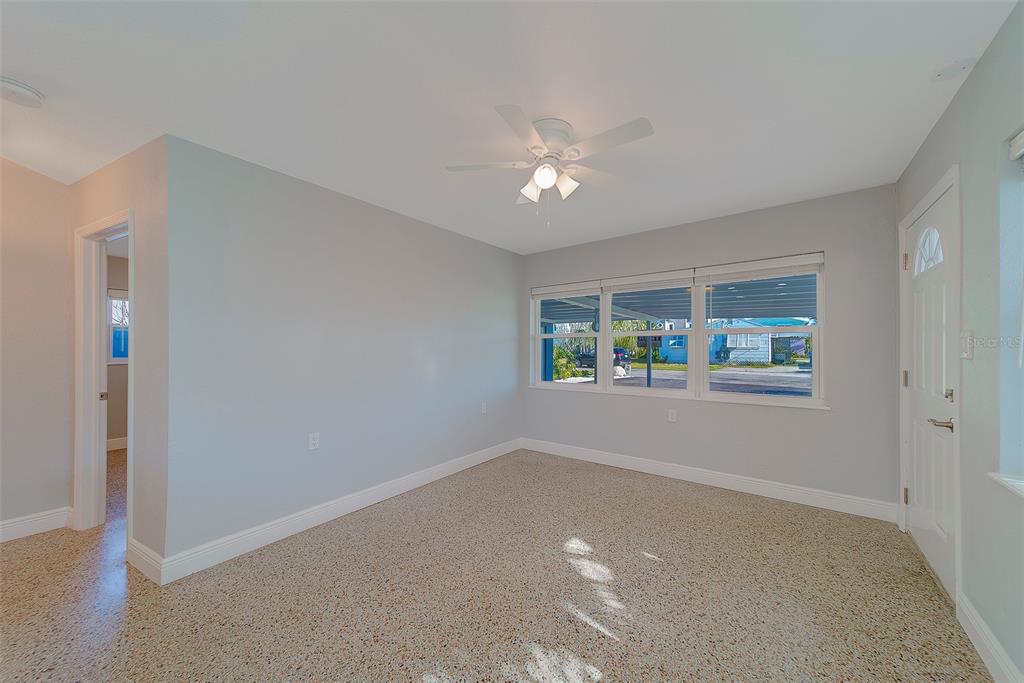 13248 4th Street East, Unit A Madeira Beach, FL 33708 - Photo 5 of 54 a view of an empty room with a window