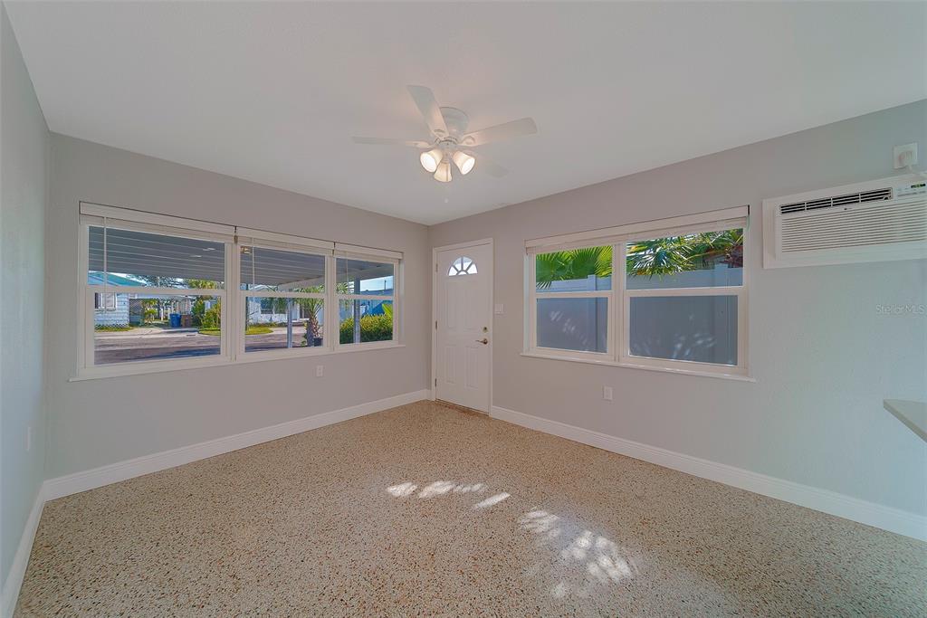 13248 4th Street East, Unit A Madeira Beach, FL 33708 - Photo 7 of 54 a view of an empty room with a window