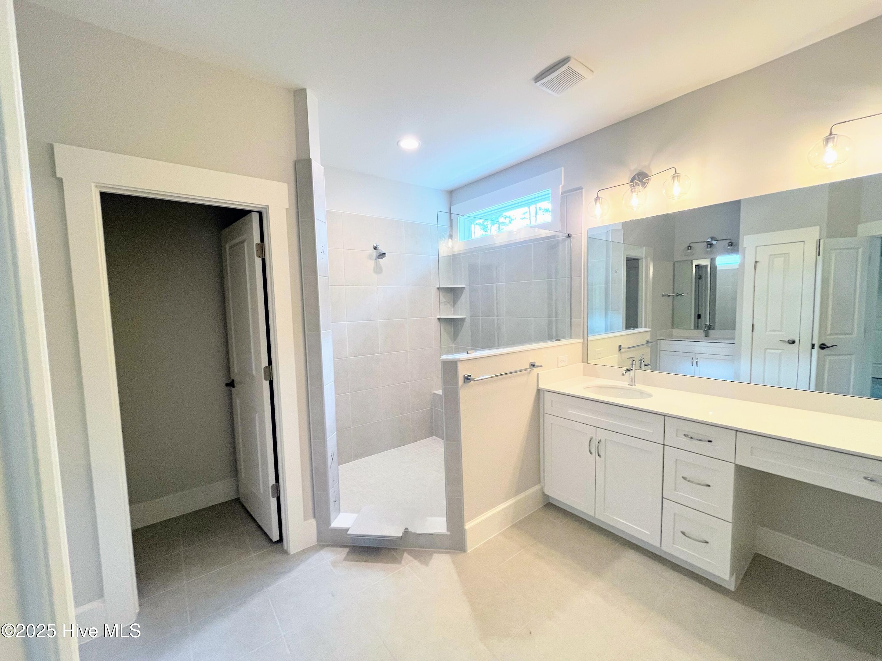 9002 Ocean Harbour Golf Club Road Southwest Calabash, NC 28467 - Photo 10 of 12 Primary bedroom bathroom