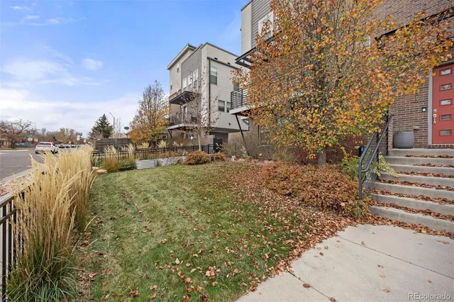 a large building with trees in front of it