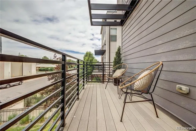 a front view of a house with stairs