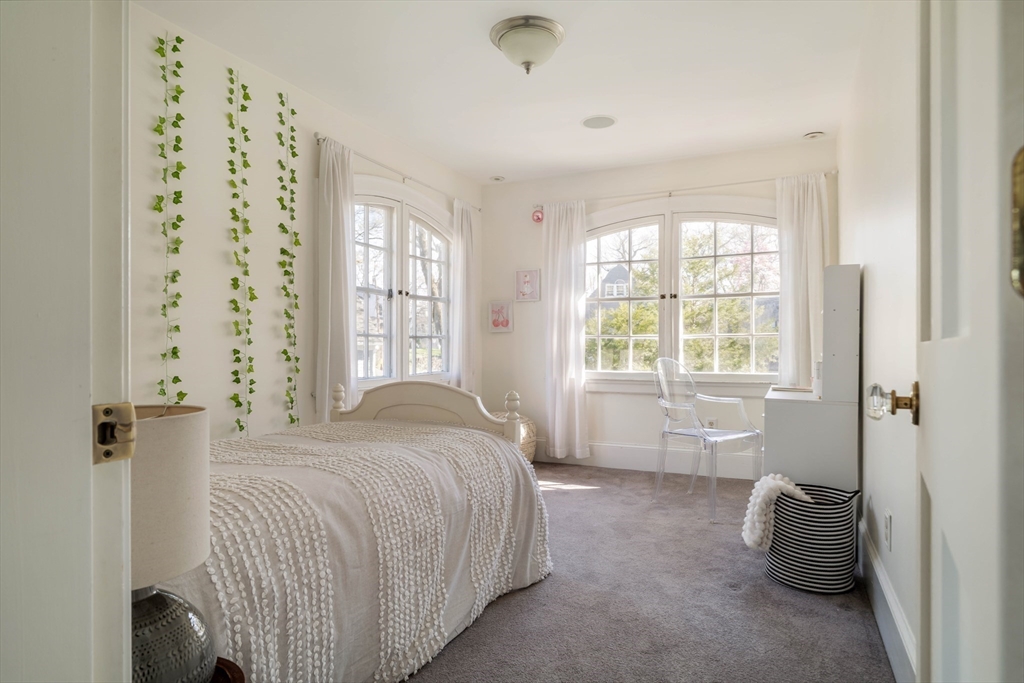 10 Rangeley Road Winchester, MA 01890 - Photo 28 of 42 a bedroom with a bed and a window