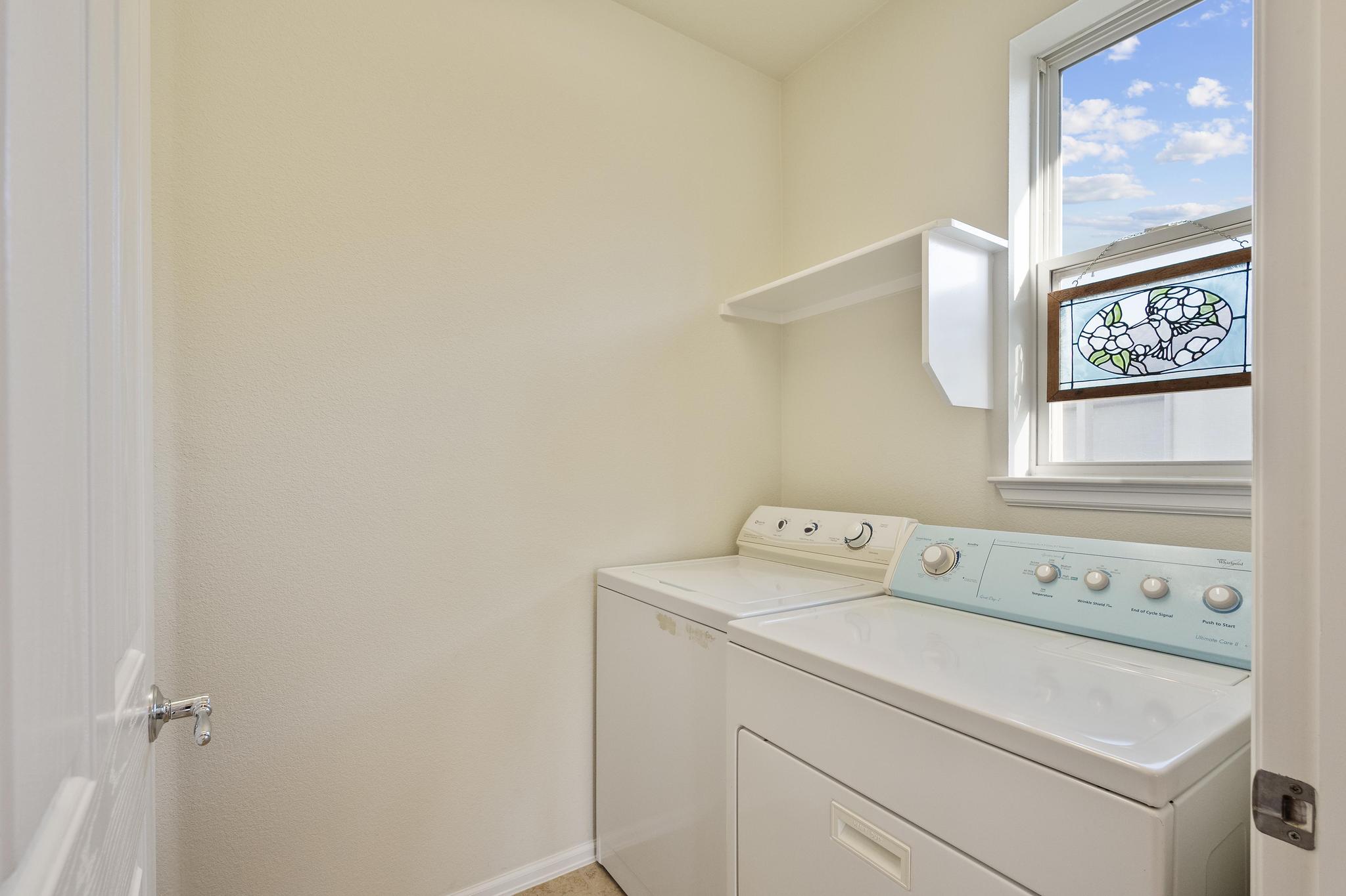 136 Prairie Creek Trail Georgetown, TX 78633 - Photo 13 of 31 a utility room with dryer and washer