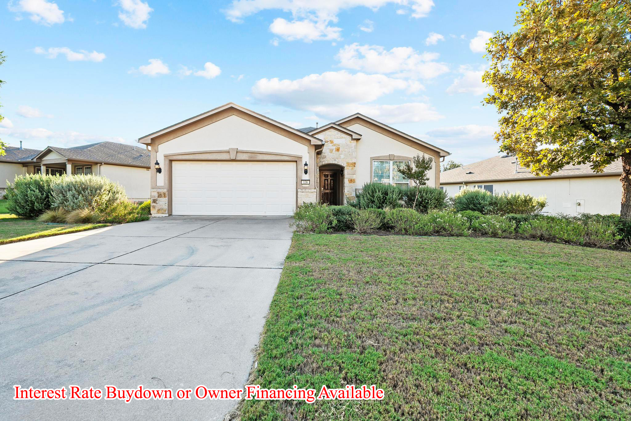 136 Prairie Creek Trail Georgetown, TX 78633 - Photo 2 of 31 a view of a house with a yard and garage