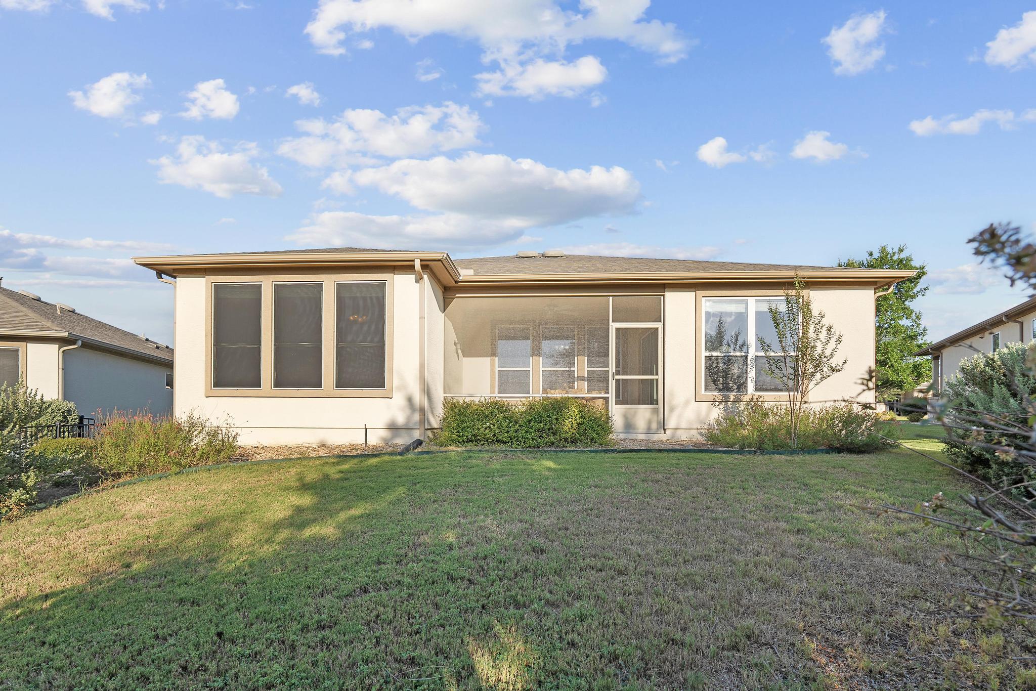 136 Prairie Creek Trail Georgetown, TX 78633 - Photo 26 of 31 a view of a house with yard and sitting area