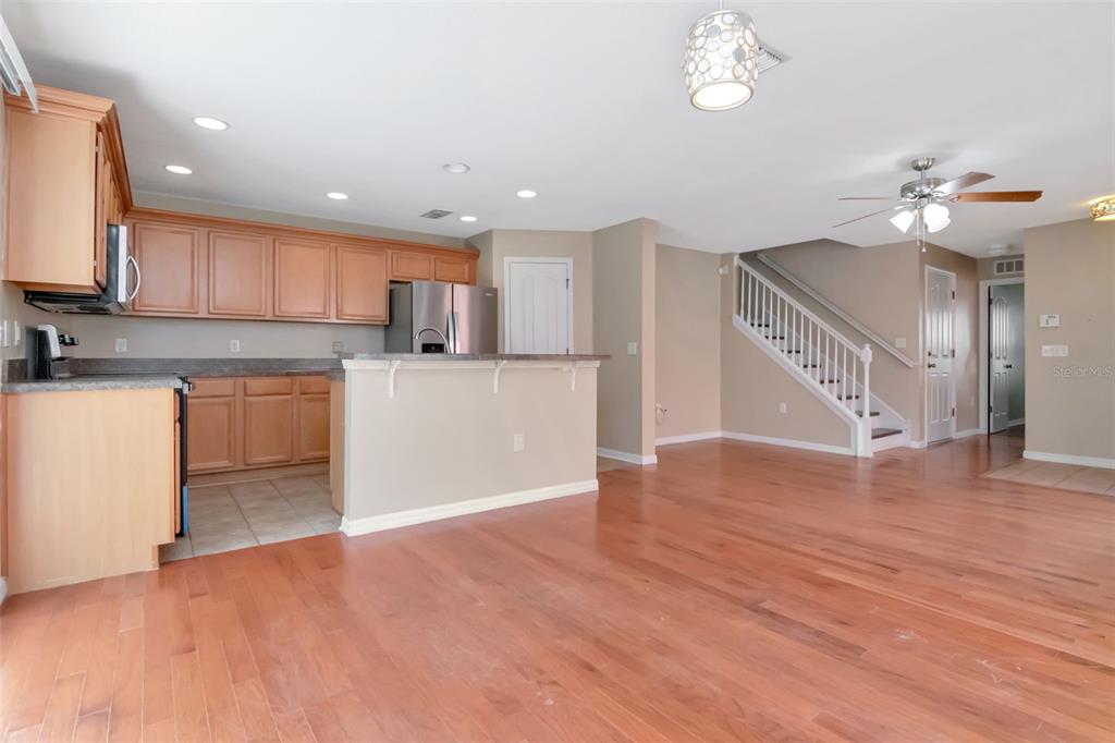6952 Marble Fawn Place Riverview, FL 33578 - Photo 11 of 42 a view of a kitchen with a sink and a microwave