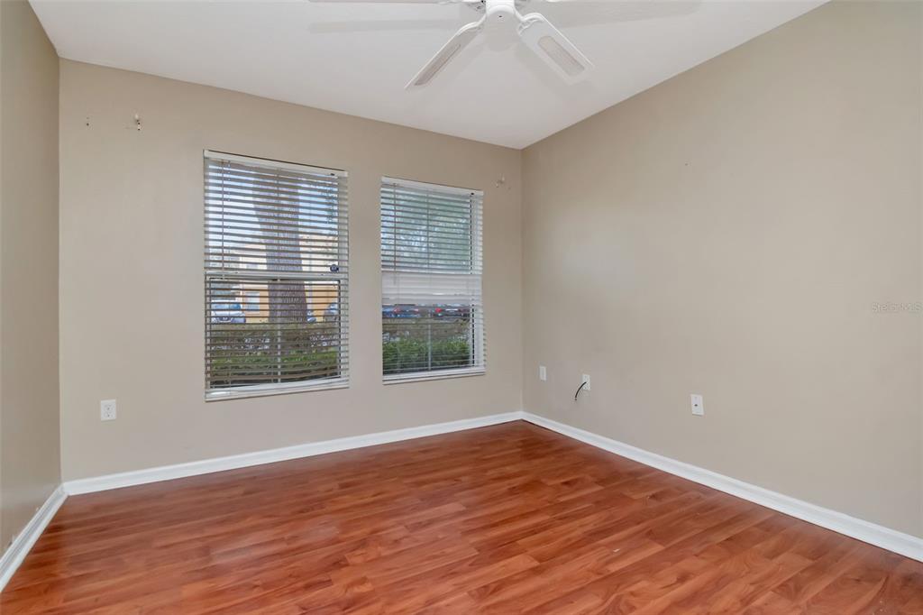 6952 Marble Fawn Place Riverview, FL 33578 - Photo 21 of 42 wooden floor in an empty room with a window