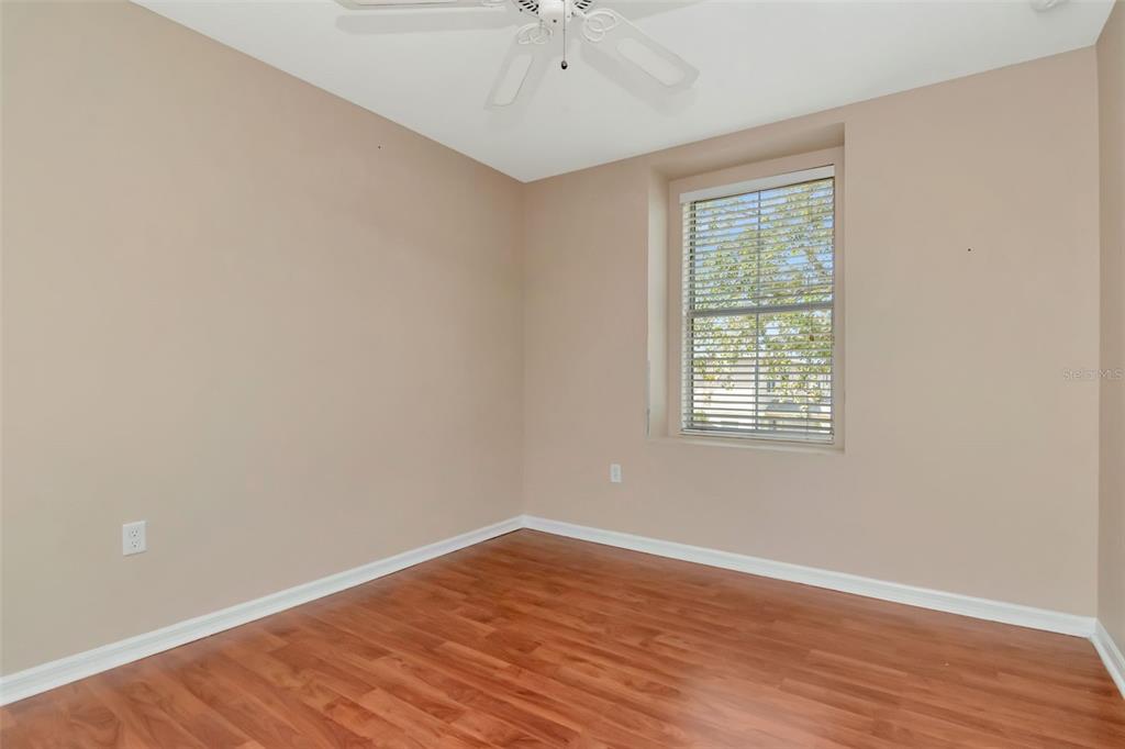 6952 Marble Fawn Place Riverview, FL 33578 - Photo 34 of 42 wooden floor in an empty room with a window