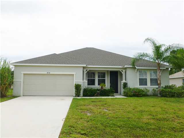 874 Southwest Commonwealth Road Port St. Lucie, FL 34953 - Photo 1 of 15 Front