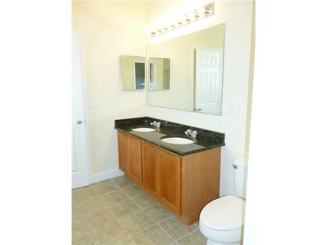 874 Southwest Commonwealth Road Port St. Lucie, FL 34953 - Photo 11 of 15 Master Bath