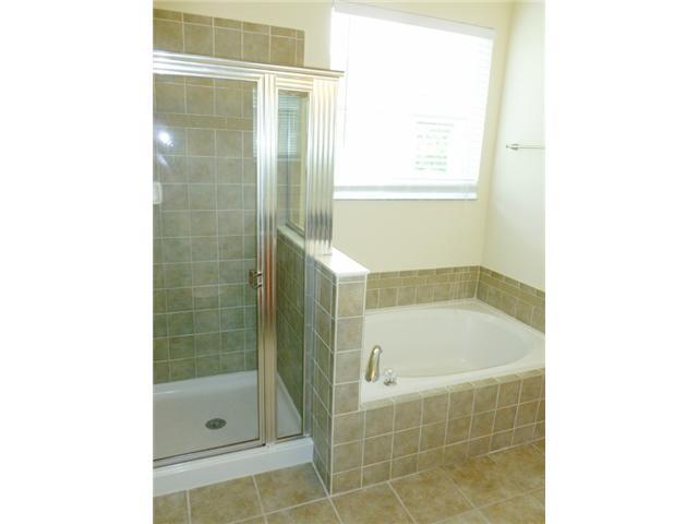 874 Southwest Commonwealth Road Port St. Lucie, FL 34953 - Photo 12 of 15 Master Bath