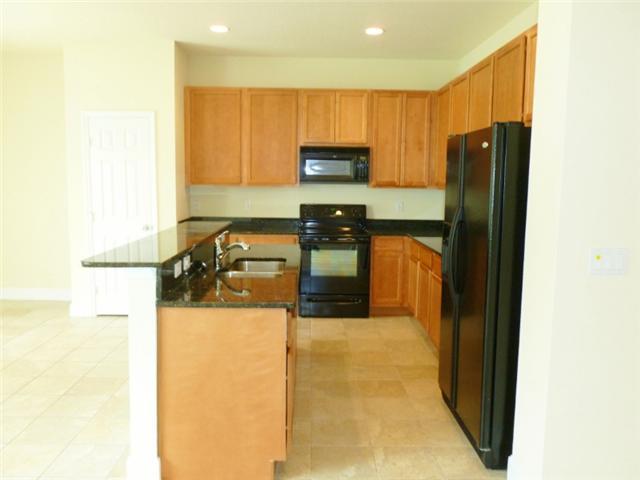874 Southwest Commonwealth Road Port St. Lucie, FL 34953 - Photo 2 of 15 Kitchen