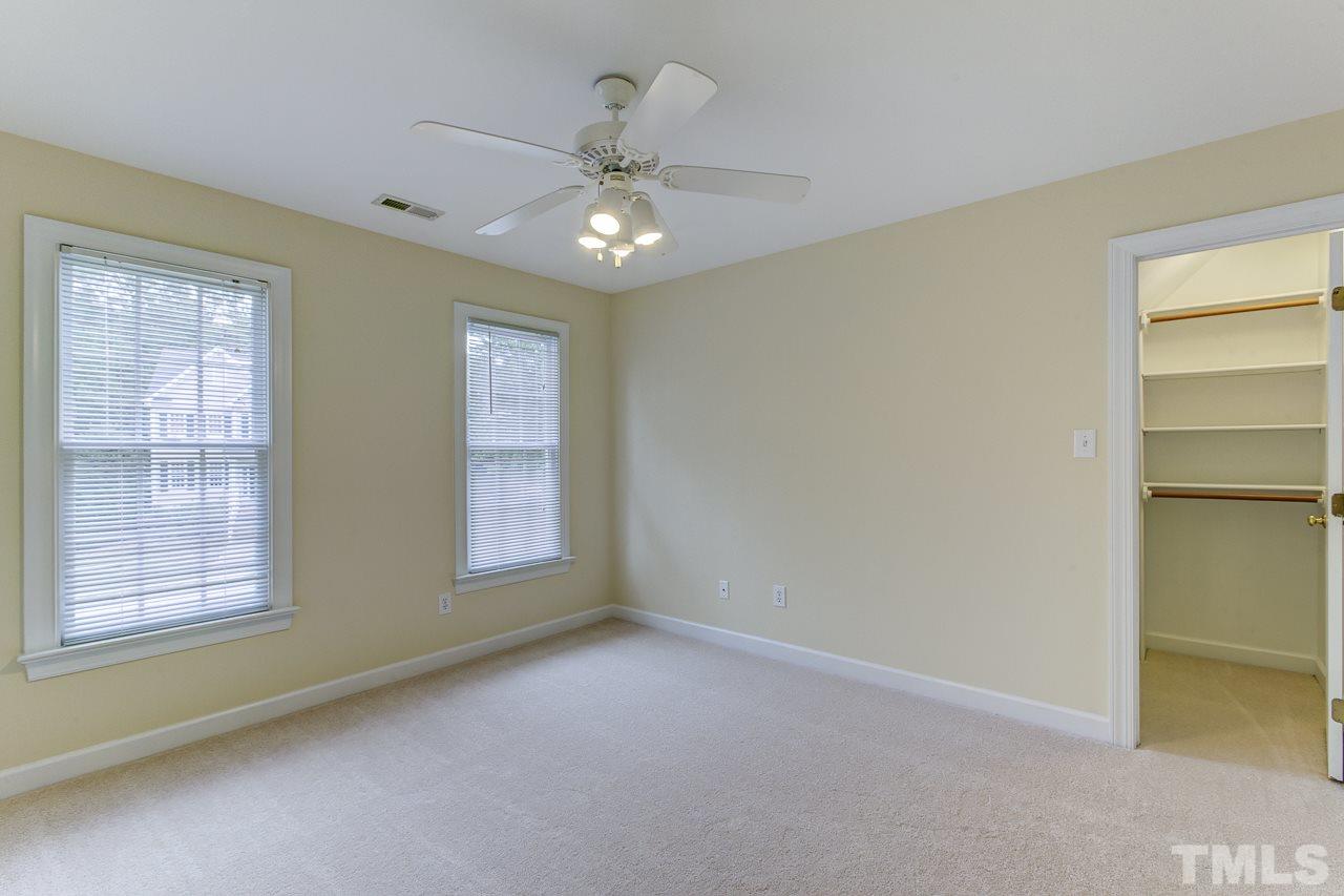 6805 Wilderness Road Raleigh, NC 27613 - Photo 20 of 25 a view of an empty room with a window