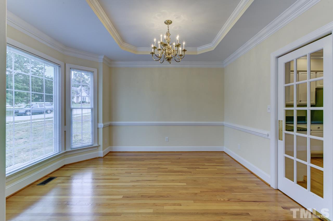 6805 Wilderness Road Raleigh, NC 27613 - Photo 5 of 25 a view of an empty room with a window