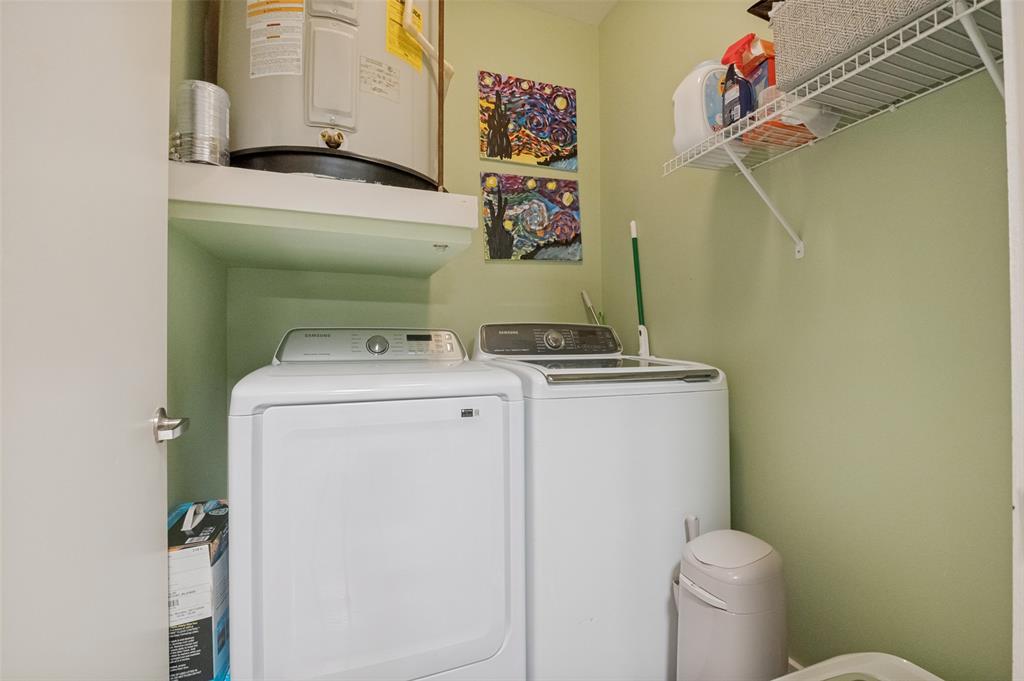 7305 Pineberry Road Dallas, TX 75249 - Photo 21 of 25 a utility room with dryer and washer