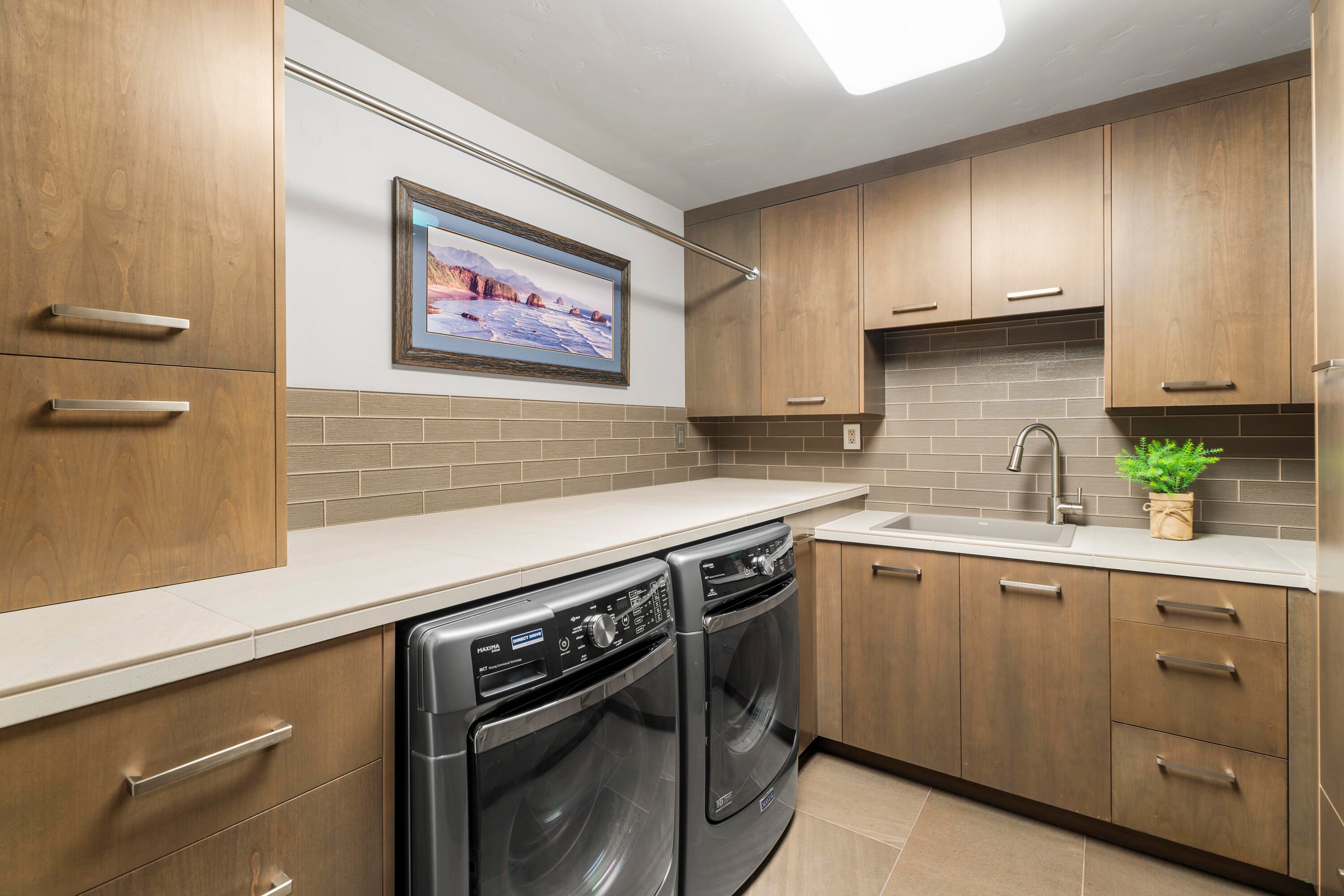 56641 Sunstone Loop, Unit 135 Bend, OR 97707 - Photo 30 of 62 Thoughtful details continue w/ central vac, oversized heated 2-car garage w/ golf cart bay plus an additional heated 1-car garage.