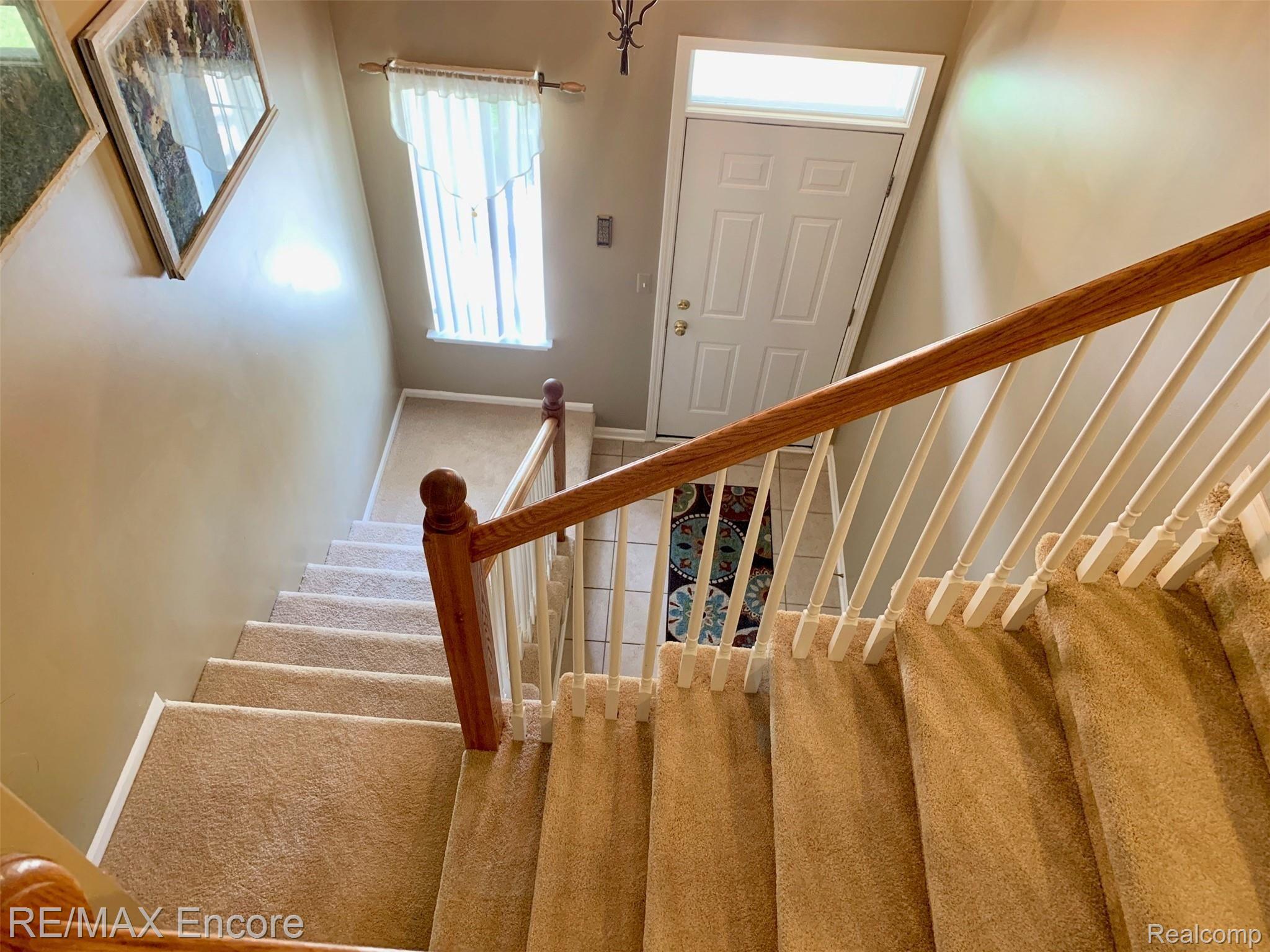 3522 Tremonte Circle Rochester, MI 48306 - Photo 21 of 31 Staircase to ranch condo