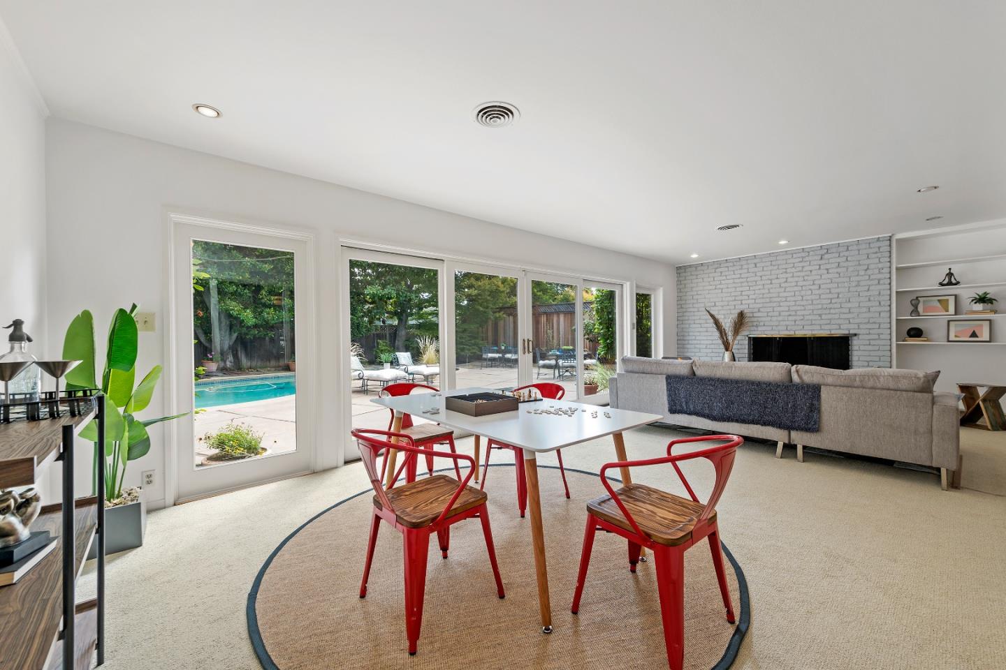 1340 Hillview Drive Menlo Park, CA 94025 - Photo 13 of 29 a dining room with furniture and a floor to ceiling window
