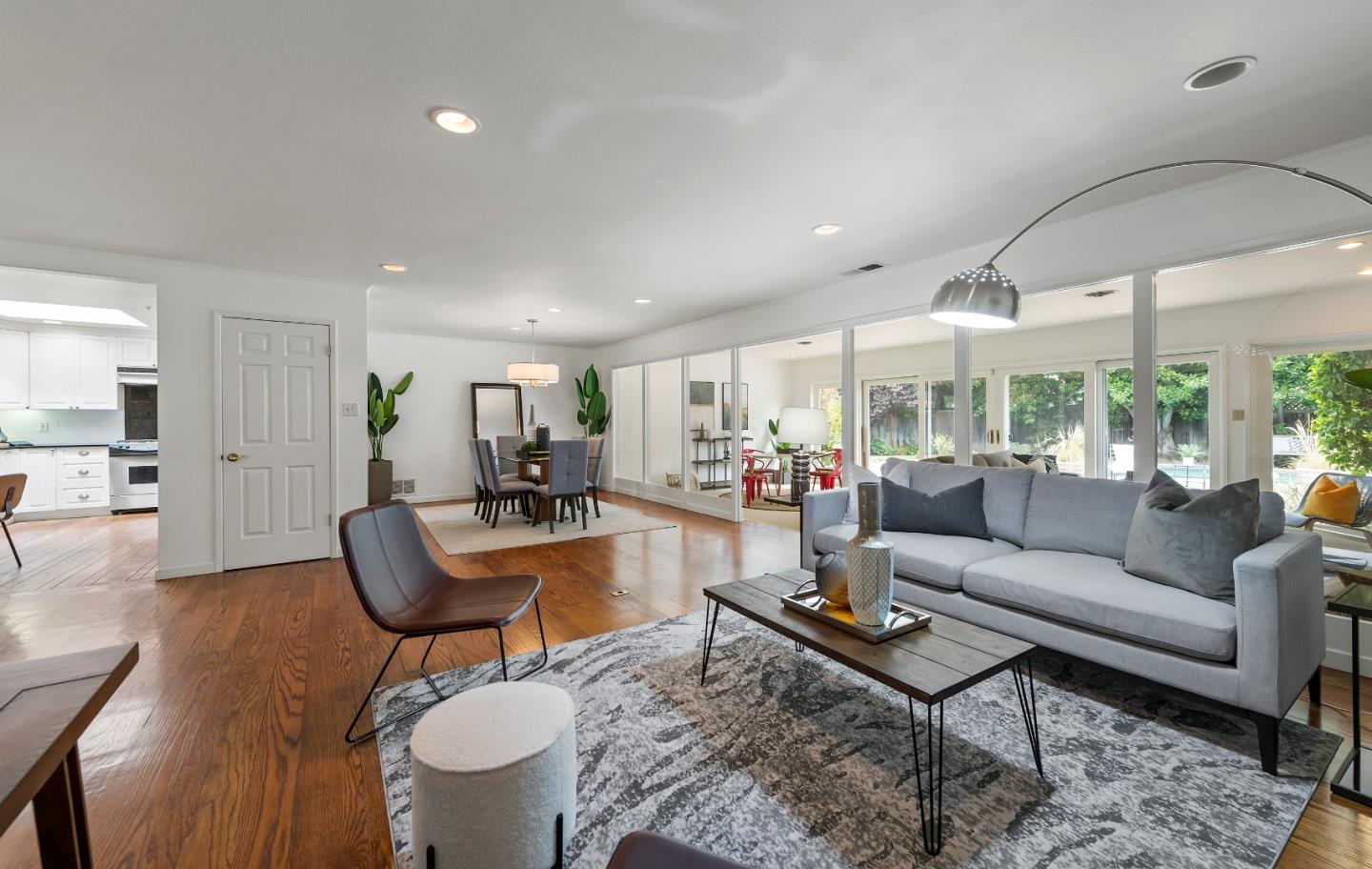 1340 Hillview Drive Menlo Park, CA 94025 - Photo 6 of 29 a living room with furniture a rug and a large window