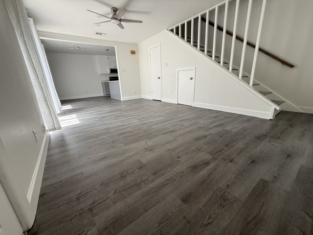 3304 Clawson Road, Unit B Austin, TX 78704 - Photo 12 of 12 An open floorplan with durable flooring connects the main living spaces and features a staircase.