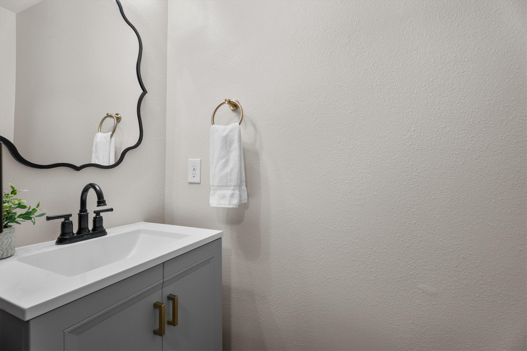 4026 Oxhill Road Spring, TX 77388 - Photo 18 of 40 The conveniently located powder bath has been tastefully updated with a modern vanity, updated fixtures, and timeless finishes.