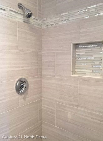 5 Pearl Street, Unit 1 Salem, MA 01970 - Photo 11 of 14 a bathroom with a shower